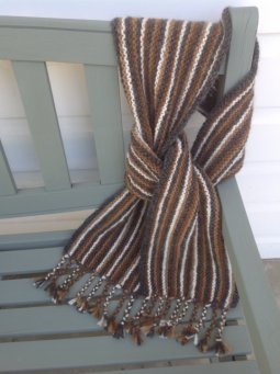 Hand knitted earthy coloured carf