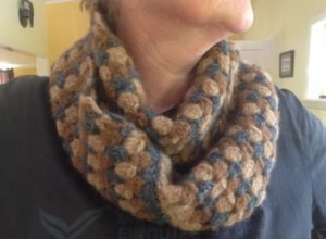 Hand knitted earthy coloured scarf