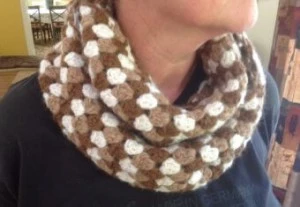 Hand knitted earthy coloured scarf